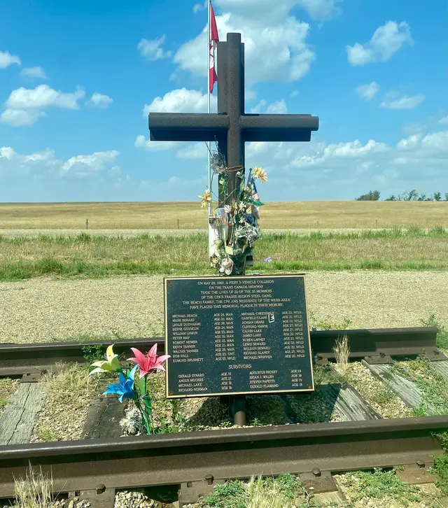 CPR steel gang memorial cross on railway tracks